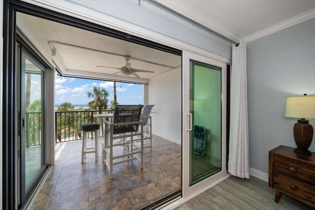 1230 Gulf Blvd Unit 304, Clearwater, FL 33767 - sunroom / solarium with crown molding, stone finish floors, and baseboards