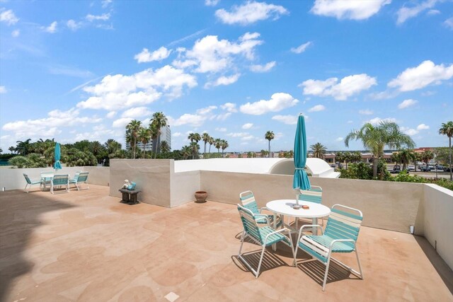 1230 Gulf Blvd Unit 304, Clearwater, FL 33767 - view of patio / terrace with outdoor dining area