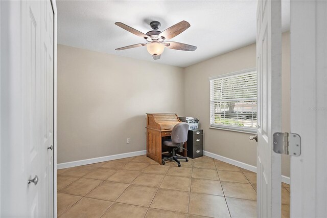 11029 Clay Pit Rd, Tampa, FL 33610 - office featuring a ceiling fan, light tile patterned flooring, and baseboards