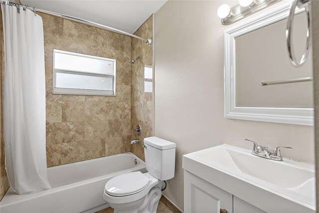 11029 Clay Pit Rd, Tampa, FL 33610 - bathroom with shower / tub combo with curtain, toilet, and vanity