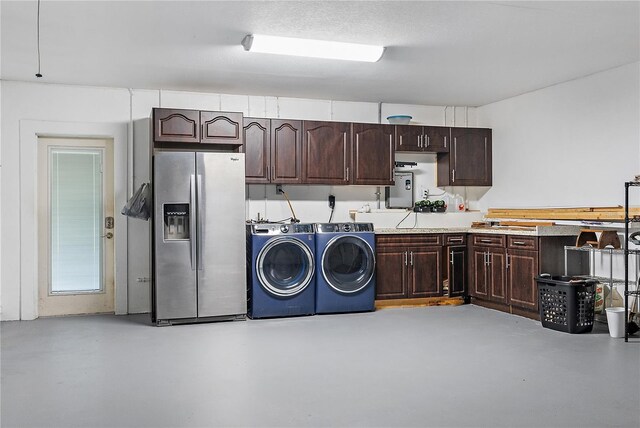 11029 Clay Pit Rd, Tampa, FL 33610 - laundry room with washing machine and clothes dryer