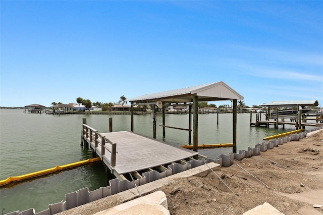 333 Midway Is, Clearwater Beach, FL 33767 - dock featuring a water view and boat lift