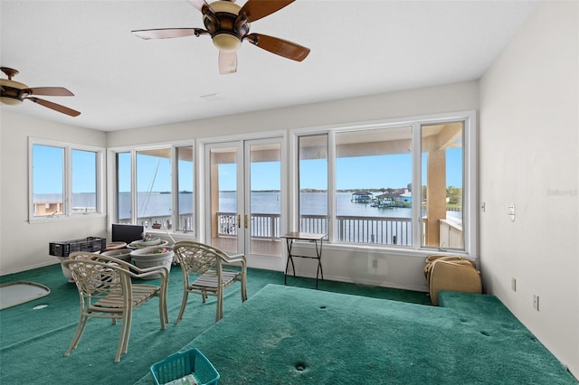 333 Midway Is, Clearwater Beach, FL 33767 - sunroom featuring a water view