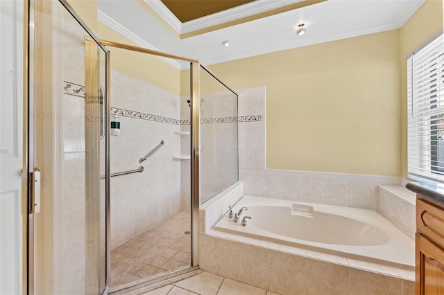 15123 Bald Eagle St, Tampa, FL 33625 - bathroom featuring crown molding, a bath, a shower stall, and tile patterned flooring