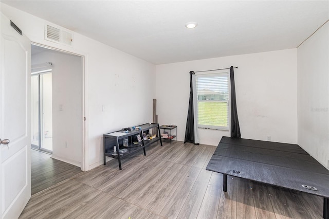 1741 Canaan Loop, Dundee, FL 33838 - living area featuring light wood-style flooring