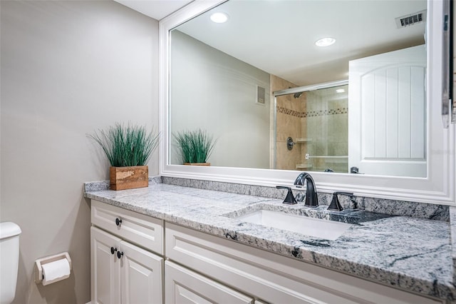 4450 Gulf Blvd Unit 110, St Pete Beach, FL 33706 - full bathroom with vanity, a tile shower, and recessed lighting