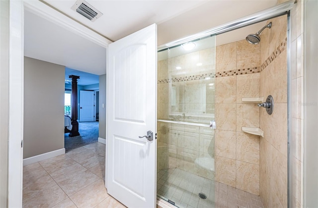 4450 Gulf Blvd Unit 110, St Pete Beach, FL 33706 - bathroom featuring a shower stall and tile patterned floors
