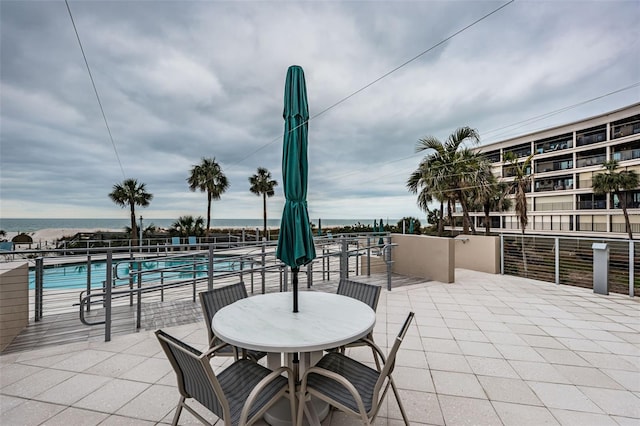 4450 Gulf Blvd Unit 110, St Pete Beach, FL 33706 - view of patio / terrace with a community pool