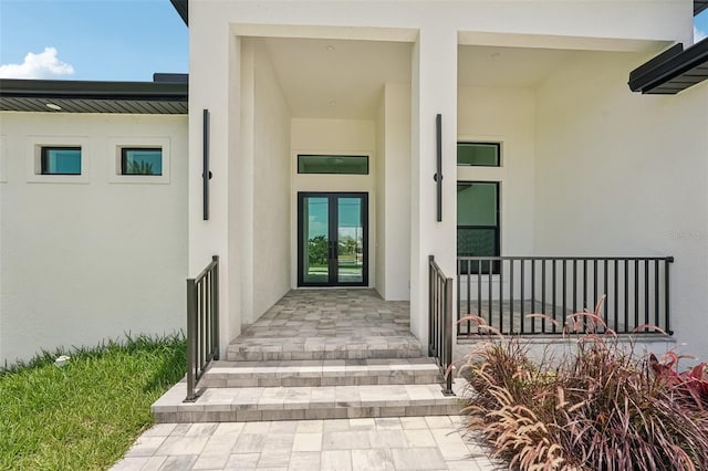 15218 Appleton Blvd, Port Charlotte, FL 33981 - entrance to property featuring stucco siding and french doors