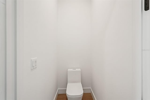 15218 Appleton Blvd, Port Charlotte, FL 33981 - bathroom with baseboards and wood finished floors