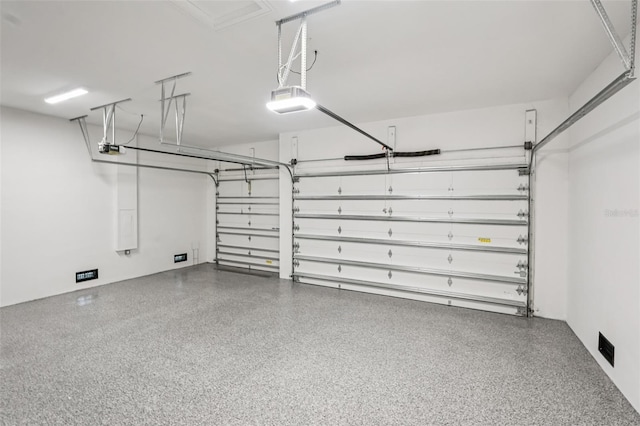 15218 Appleton Blvd, Port Charlotte, FL 33981 - garage featuring a garage door opener