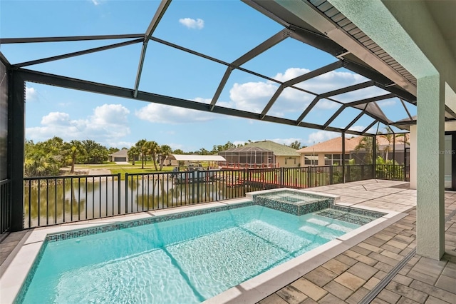 15218 Appleton Blvd, Port Charlotte, FL 33981 - view of swimming pool featuring a water view, a patio area, glass enclosure, and a pool with connected hot tub