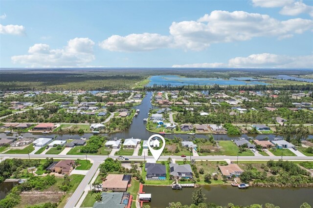 15218 Appleton Blvd, Port Charlotte, FL 33981 - aerial perspective of suburban area featuring a large body of water