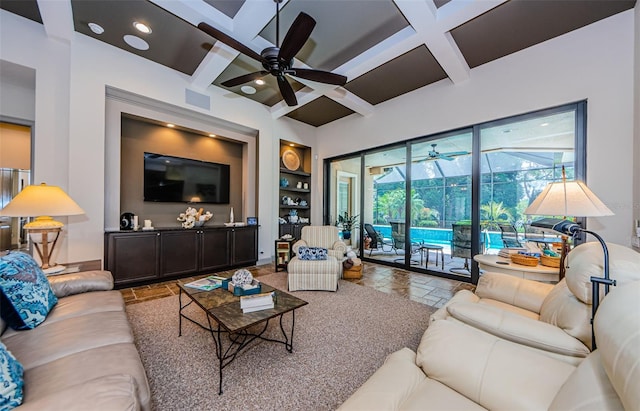 1012 Tuscany Dr, Trinity, FL 34655 - living area with a ceiling fan, stone tile floors, coffered ceiling, built in features, and a sunroom