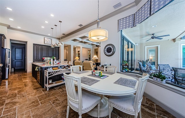 1012 Tuscany Dr, Trinity, FL 34655 - dining room featuring ceiling fan, recessed lighting, stone tile floors, and crown molding