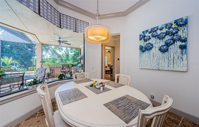 1012 Tuscany Dr, Trinity, FL 34655 - dining area with stone tile flooring, ceiling fan, and ornamental molding