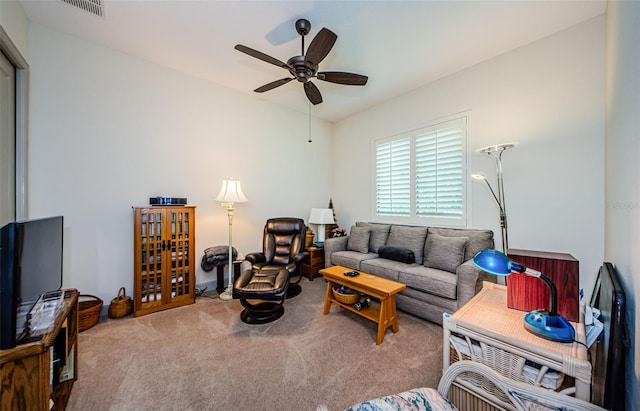 1012 Tuscany Dr, Trinity, FL 34655 - carpeted living area featuring ceiling fan and vaulted ceiling