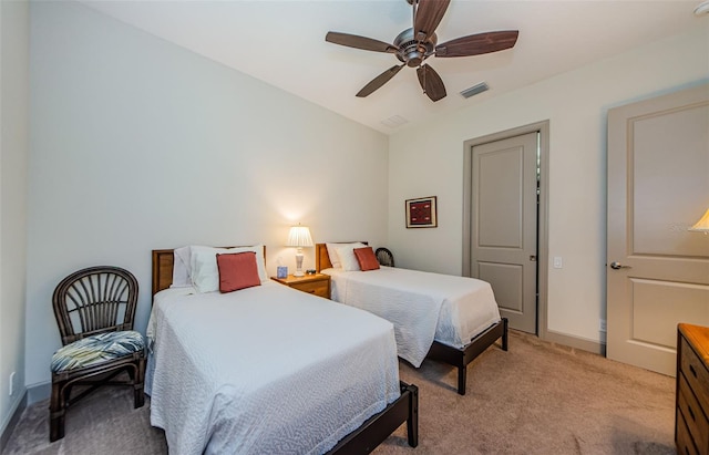1012 Tuscany Dr, Trinity, FL 34655 - bedroom with light colored carpet and ceiling fan