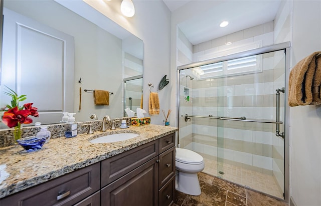 1012 Tuscany Dr, Trinity, FL 34655 - full bath with vanity, a shower stall, and stone finish floors