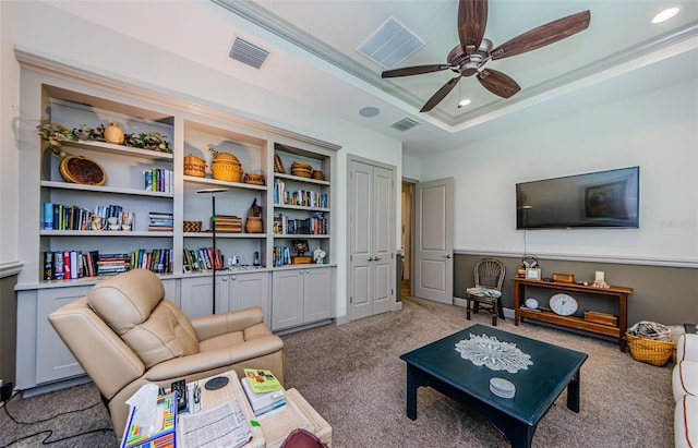 1012 Tuscany Dr, Trinity, FL 34655 - living room with carpet flooring, a ceiling fan, a tray ceiling, and recessed lighting