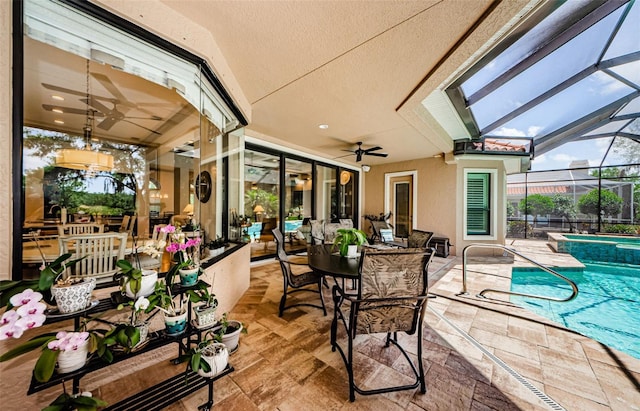 1012 Tuscany Dr, Trinity, FL 34655 - sunroom / solarium featuring ceiling fan and a hot tub