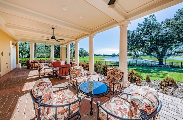 1012 Tuscany Dr, Trinity, FL 34655 - view of patio featuring a ceiling fan, a water view, an outdoor hangout area, and outdoor dining space