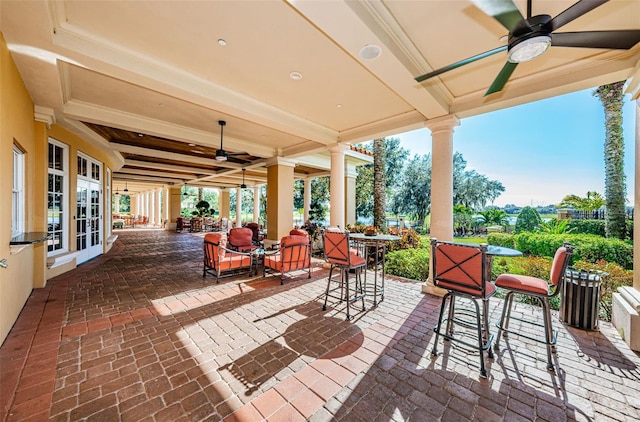 1012 Tuscany Dr, Trinity, FL 34655 - view of patio featuring a ceiling fan, french doors, and outdoor dining area