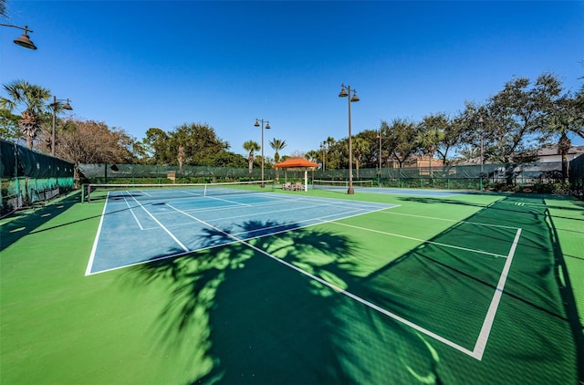 1012 Tuscany Dr, Trinity, FL 34655 - view of tennis court featuring community basketball court