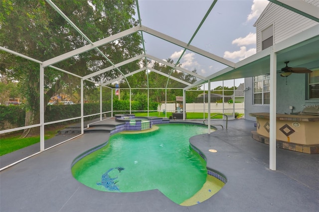 3633 Springville Dr, Valrico, FL 33596 - view of swimming pool with a patio, a ceiling fan, a fenced backyard, a pool with connected hot tub, and glass enclosure
