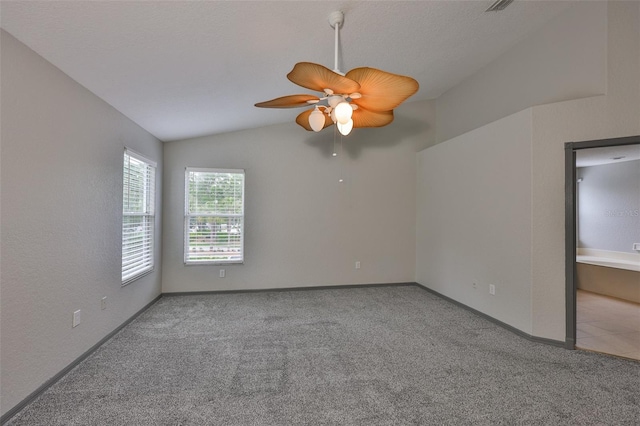 3633 Springville Dr, Valrico, FL 33596 - carpeted empty room with lofted ceiling, ceiling fan, and baseboards