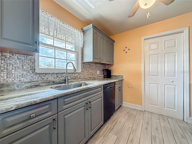 200 Country Club Dr Unit 202, Largo, FL 33771 - kitchen featuring dishwasher, gray cabinetry, a sink, and a ceiling fan