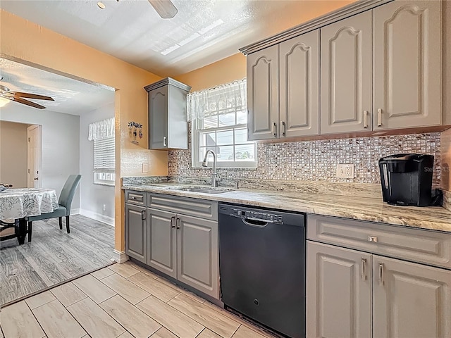 200 Country Club Dr Unit 202, Largo, FL 33771 - kitchen featuring ceiling fan, black dishwasher, a sink, and gray cabinetry