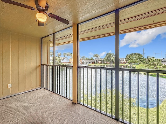 200 Country Club Dr Unit 202, Largo, FL 33771 - unfurnished sunroom with a water view