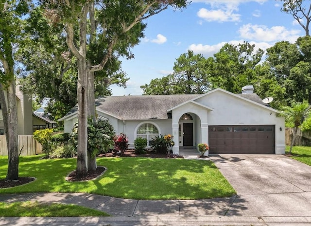 6051 65th Ave N, Pinellas Park, FL 33781 - single story home featuring a garage, stucco siding, concrete driveway, and a chimney