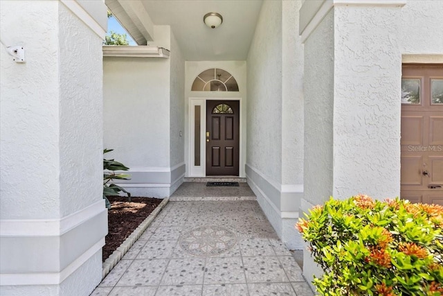 6051 65th Ave N, Pinellas Park, FL 33781 - doorway to property with stucco siding