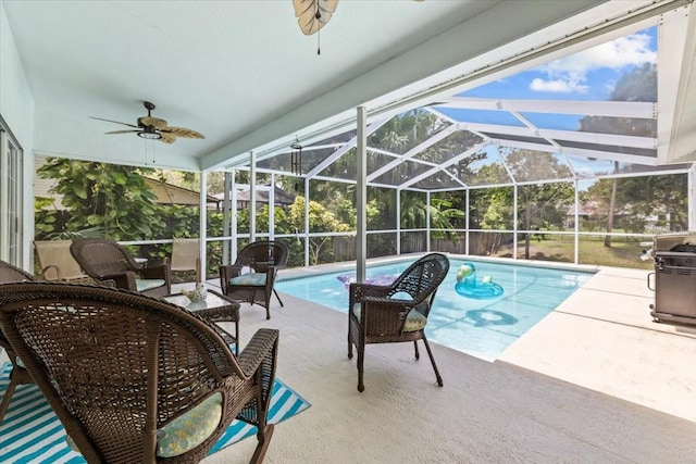 6051 65th Ave N, Pinellas Park, FL 33781 - outdoor pool with a ceiling fan, a patio area, and glass enclosure