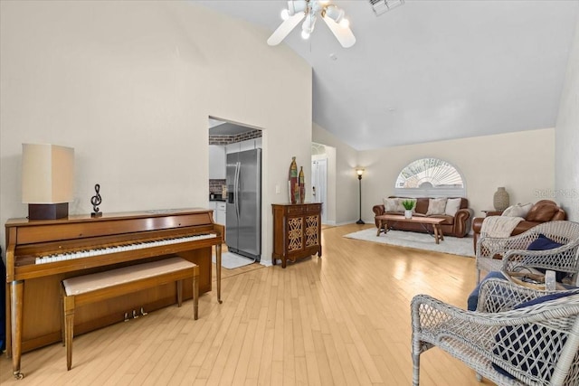 6051 65th Ave N, Pinellas Park, FL 33781 - sitting room with a ceiling fan, high vaulted ceiling, and light wood-type flooring