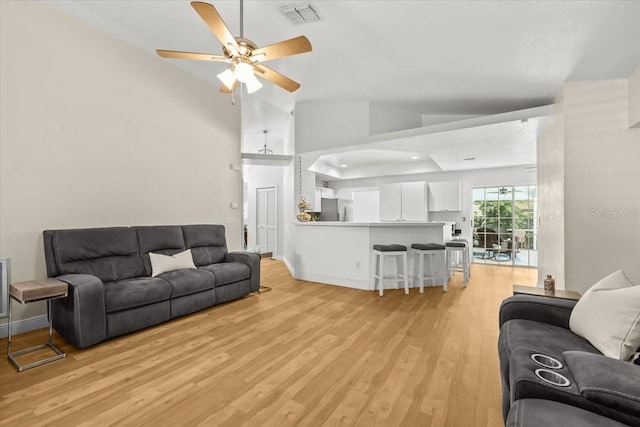 6051 65th Ave N, Pinellas Park, FL 33781 - living room with a ceiling fan, light wood-type flooring, and lofted ceiling