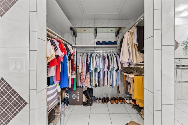 6051 65th Ave N, Pinellas Park, FL 33781 - walk in closet with attic access and tile patterned flooring