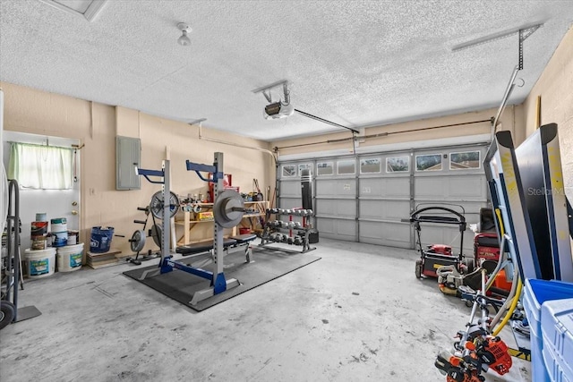 6051 65th Ave N, Pinellas Park, FL 33781 - garage featuring electric panel and a garage door opener