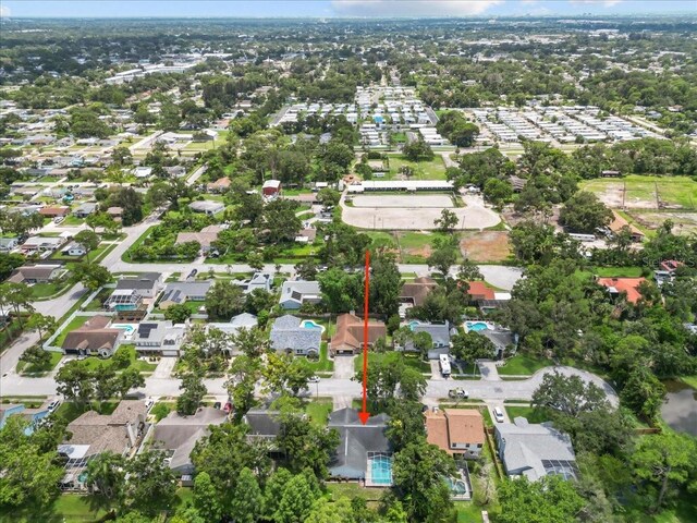 6051 65th Ave N, Pinellas Park, FL 33781 - aerial view of property and surrounding area featuring nearby suburban area