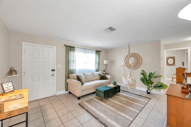 3371 N Bay Ave, Crystal River, FL 34428 - living room with light tile patterned floors and baseboards