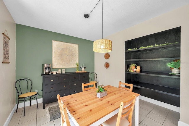 3371 N Bay Ave, Crystal River, FL 34428 - dining area with light tile patterned floors and baseboards
