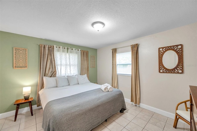 3371 N Bay Ave, Crystal River, FL 34428 - bedroom featuring light tile patterned floors and a textured ceiling