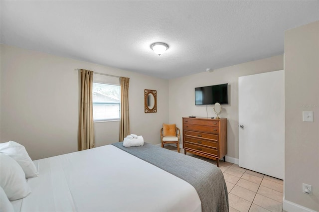 3371 N Bay Ave, Crystal River, FL 34428 - bedroom featuring a textured ceiling and light tile patterned floors