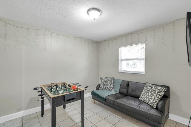 3371 N Bay Ave, Crystal River, FL 34428 - recreation room with a textured ceiling and light tile patterned floors