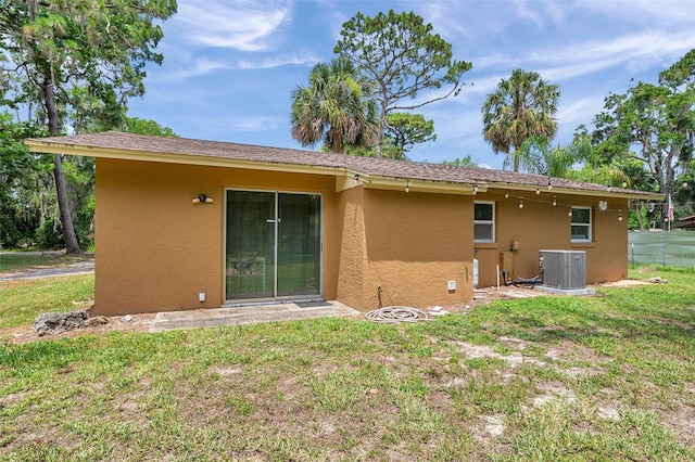 3371 N Bay Ave, Crystal River, FL 34428 - back of house featuring stucco siding