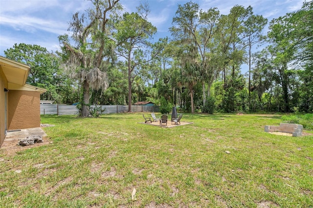 3371 N Bay Ave, Crystal River, FL 34428 - view of yard featuring a fire pit and a patio area