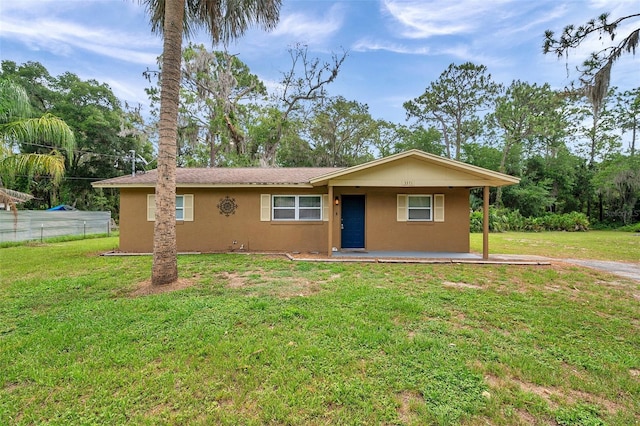 3371 N Bay Ave, Crystal River, FL 34428 - ranch-style house featuring stucco siding and a porch