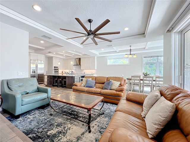 1204 Derby Ln, Sarasota, FL 34242 - living area featuring coffered ceiling, a ceiling fan, recessed lighting, beam ceiling, and a textured ceiling